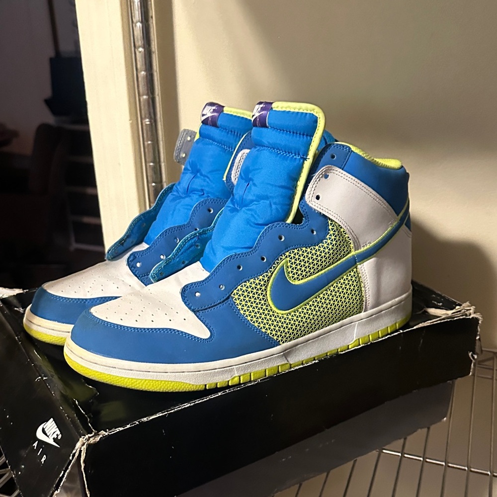 Nike Blue and White High-Top Sneakers with Neon Accents